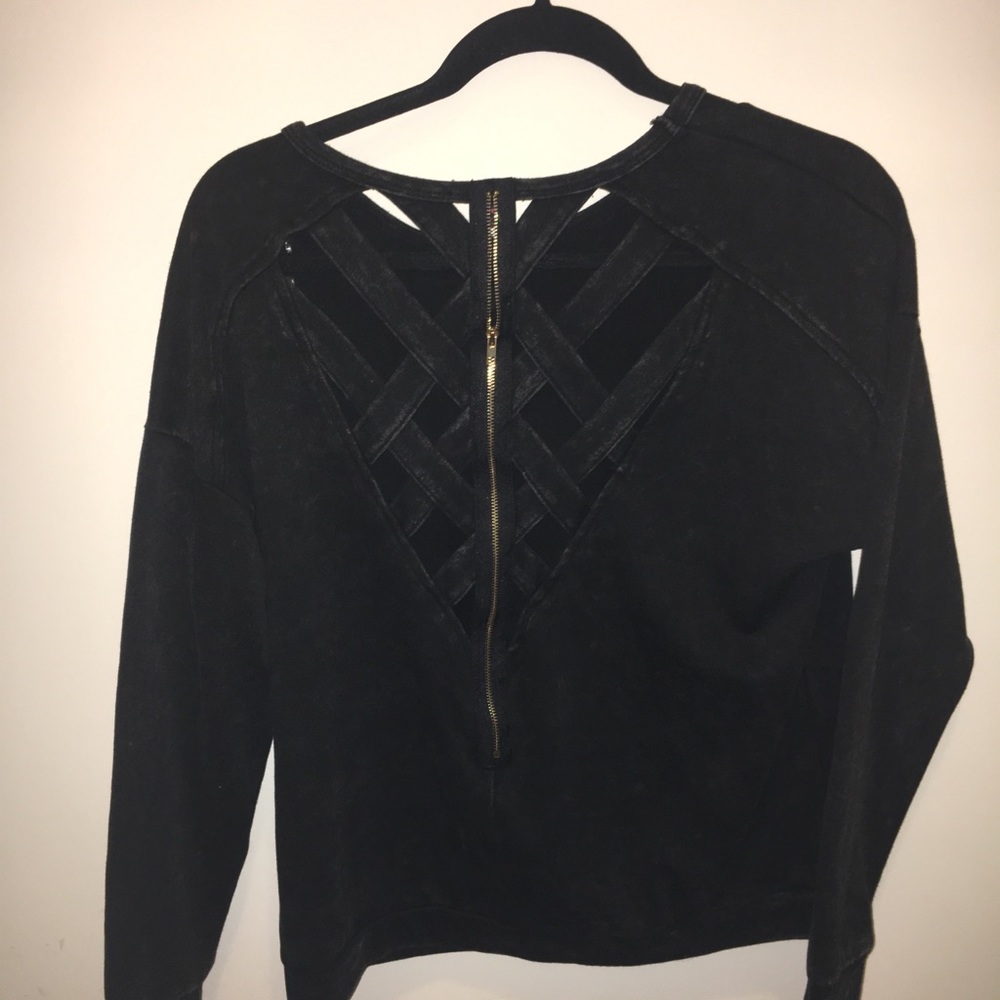 Distressed black sweater with cross-cross backing